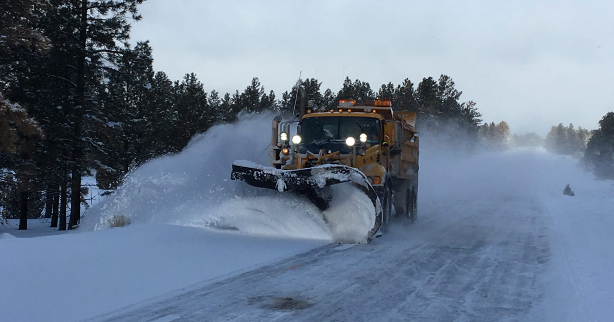 ADOT road works snow plow at work