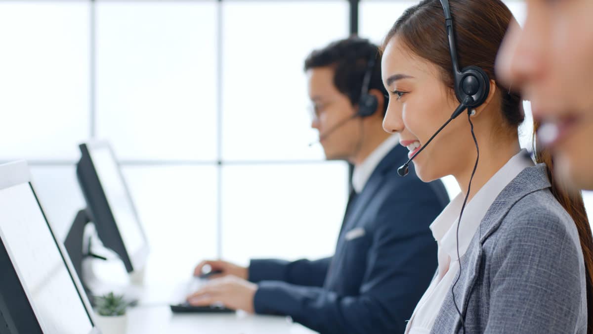 Insurance operator speaking to customer on the phone