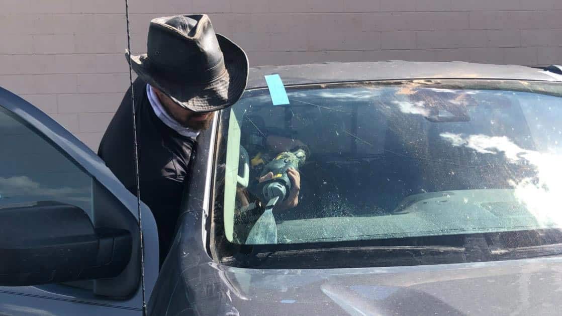 Inspector's Auto Tech Installing New Windshield