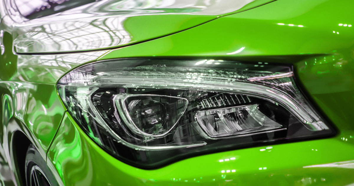 Glossy shine on green sports car